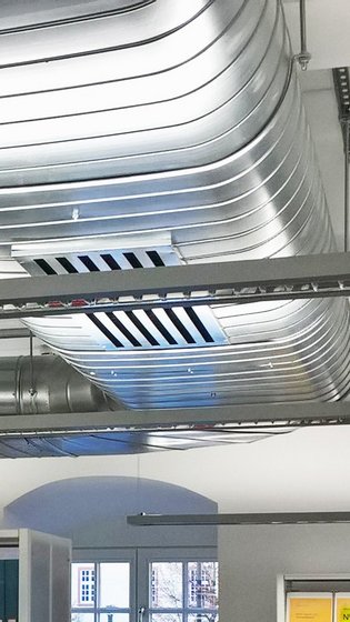 Sichtmontage Ovalrohrsystem in der Teilbibliothek Unteres Schloß (US) in Siegen